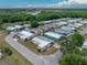 Scenic aerial shot of a charming home, showcasing nearby community amenities and lush green spaces at 1823 Sherwood Hill Dr, Lakeland, FL 33810