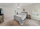 Bright main bedroom with large windows and neutral carpet at 1823 Sherwood Hill Dr, Lakeland, FL 33810