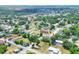 An aerial view of a neighborhood with mature trees and lush lawns, highlighting community charm at 1850 Martin Luther King, Jr. E Blvd, Bartow, FL 33830