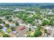 An aerial view of a neighborhood with mature trees and lush lawns, highlighting community charm at 1850 Martin Luther King, Jr. E Blvd, Bartow, FL 33830