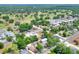 An aerial view of a neighborhood with mature trees and lush lawns, highlighting community charm at 1850 Martin Luther King, Jr. E Blvd, Bartow, FL 33830