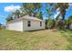 A view of a home with a spacious backyard and healthy green grass, perfect for outdoor activities at 1850 Martin Luther King, Jr. E Blvd, Bartow, FL 33830