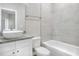 Modern bathroom with vessel sink, granite counters, and tiled shower and bathtub at 1850 Martin Luther King, Jr. E Blvd, Bartow, FL 33830