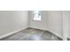 Cozy bedroom with grey floors, ample sunlight, and clean design at 1850 Martin Luther King, Jr. E Blvd, Bartow, FL 33830