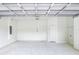 A spacious, unfinished two-car garage with a concrete floor, offering ample storage and parking at 1850 Martin Luther King, Jr. E Blvd, Bartow, FL 33830