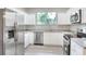 Bright kitchen features stainless appliances, granite countertops and white cabinets at 1850 Martin Luther King, Jr. E Blvd, Bartow, FL 33830