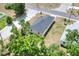 Aerial view of the home with a new roof, green grass, and located near an intersection at 1890 Martin Luther King, Jr. E Blvd, Bartow, FL 33830