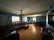 Image displaying the living room highlighting the seating area, flooring and windows at 216 Varnadoe Rd, Winter Haven, FL 33880