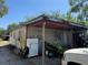 View of a single-story home showing a covered carport, exterior, and condition at 216 Varnadoe Rd, Winter Haven, FL 33880