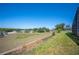 View of the expansive backyard and neighborhood from the property, ideal for outdoor activities and relaxation at 217 Dillon Way, Davenport, FL 33897