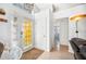 Bright foyer with tiled flooring, neutral walls, and an arched window allowing natural light to flow in at 217 Dillon Way, Davenport, FL 33897