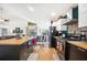 Bright kitchen features a butcher block island, stainless steel appliances, and an open layout at 217 Dillon Way, Davenport, FL 33897
