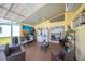 Covered patio featuring outdoor seating and grill, great for entertaining guests at 217 Dillon Way, Davenport, FL 33897