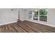 Bedroom featuring hardwood floors and lots of natural light at 2400 Avenue D Sw, Winter Haven, FL 33880