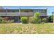 Townhome with screened lanai, patio, and lawn at 2500 21St Nw St # 78, Winter Haven, FL 33881