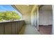 Private covered balcony with views of a majestic shade tree at 2500 21St Nw St # 78, Winter Haven, FL 33881