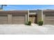 Townhouse front entrance featuring a private door and single-car garage at 2500 21St Nw St # 78, Winter Haven, FL 33881