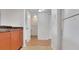 Kitchen view with wood cabinets, granite countertops and white appliances at 2500 21St Nw St # 78, Winter Haven, FL 33881