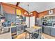 Charming kitchen features stainless steel appliances, granite countertops, and stylish backsplash at 3728 Old Polk City Rd, Lakeland, FL 33809