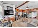 A stylish living room is open to kitchen with an open floor plan, perfect for entertaining at 3728 Old Polk City Rd, Lakeland, FL 33809