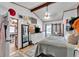 Bright bedroom with wood paneling, ceiling fan, natural light, and furniture at 3728 Old Polk City Rd, Lakeland, FL 33809