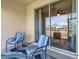 Inviting lanai with stylish furniture and sliding glass door access at 4089 Shade Tree Ln, Lakeland, FL 33812