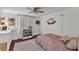 Cozy bedroom featuring warm, neutral decor, a plush bed, and decorative accents for a relaxing retreat at 435 Lyle Pkwy, Bartow, FL 33830
