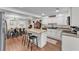 Modern kitchen with an island and seating, updated appliances, and adjoining dining area at 435 Lyle Pkwy, Bartow, FL 33830