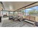 Spacious screened patio with comfortable seating, dining area, and view of the backyard at 435 Lyle Pkwy, Bartow, FL 33830