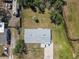 Birds eye view of cozy home surrounded by RVs and green spaces at 4830 Melody Ln, Lakeland, FL 33805