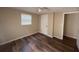 Bedroom with new flooring and a ceiling fan at 4830 Melody Ln, Lakeland, FL 33805