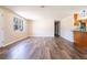 Open living room with new flooring and a large window at 4830 Melody Ln, Lakeland, FL 33805