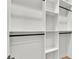 Custom closet with adjustable shelving and hanging rods for optimal organization at 5087 Cliffside Drive, Lakeland, FL 33813