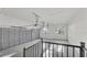 Spacious three-car garage with epoxy flooring, large windows, and an automatic door opener at 5087 Cliffside Drive, Lakeland, FL 33813