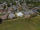 Aerial view of the home nestled in a residential neighborhood with lush greenery at 538 Eagle Run, Lakeland, FL 33809