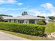 Charming single-story home featuring a well-manicured lawn, mature landscaping, and a welcoming facade at 538 Eagle Run, Lakeland, FL 33809