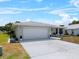 Inviting single-level residence with a two-car garage and a well-maintained lawn at 538 Eagle Run, Lakeland, FL 33809