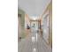 Inviting foyer with decorative walls, tile flooring and a view of the front door at 538 Eagle Run, Lakeland, FL 33809