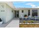 Charming home exterior with stone landscaping, front patio and welcoming front door at 538 Eagle Run, Lakeland, FL 33809