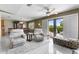 Bright living room with sliding glass doors, tile flooring and comfortable seating arrangement at 538 Eagle Run, Lakeland, FL 33809