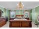 Spacious main bedroom featuring a chandelier and large windows at 538 Eagle Run, Lakeland, FL 33809