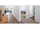 Hallway with wood floors leading to the bedroom at 5534 Turkey Creek Way, Lakeland, FL 33811