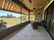 Enjoy relaxing on the screened lanai with serene views of the backyard at 564 Meandering Way, Polk City, FL 33868