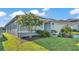 Charming single-Gathering home with well-maintained landscaping, a two-car garage, and inviting curb appeal at 613 Sarner Pass Way, Winter Haven, FL 33881