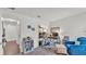 Bright home office with dual desks, white walls, comfortable seating and natural light at 613 Sarner Pass Way, Winter Haven, FL 33881