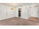 Cozy dining area with vintage chandelier that adjoins kitchen and a tiled hallway at 697 Broadmoor Cir, Winter Haven, FL 33884