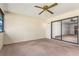 Lanai with a ceiling fan and a sliding glass door to the interior at 697 Broadmoor Cir, Winter Haven, FL 33884