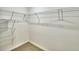 Walk-in closet with carpeted floor and wire shelving for organized storage at 752 Reggie Rd, Winter Haven, FL 33884