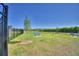 Community dog park with benches, green space and modern metal fencing at 752 Reggie Rd, Winter Haven, FL 33884
