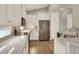 Modern kitchen with granite countertops, stainless steel appliances, and ample cabinet space at 7779 Lake James Blvd, Lakeland, FL 33810